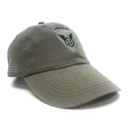 11th Airborne Division OD Cap featuring a black embroidered Airborne winged shield patch on the front and a black embroidered American flag on the side, set against a plain white background.
