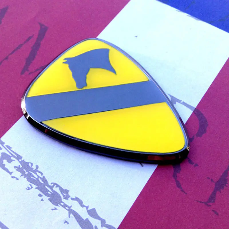 1st Cavalry Division Metal Auto Decal Full Color pointing right on a red, white and blue background