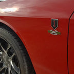 Red and Black 1st Infantry Division Metal Car Emblem on red Truck above CIB badge decal