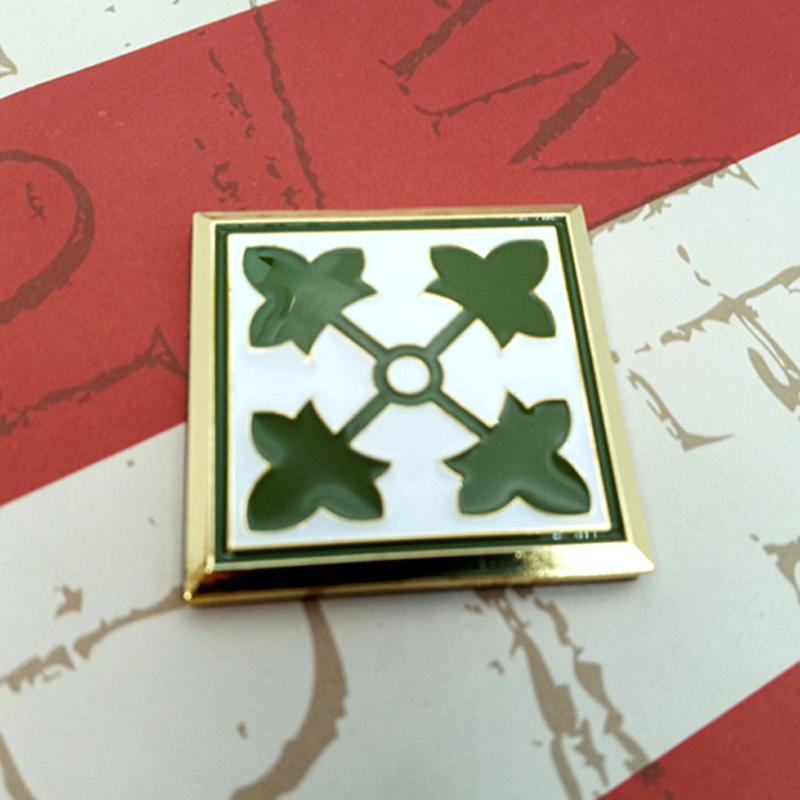 4th Infantry Division Metal Auto Emblem on a red and white background
