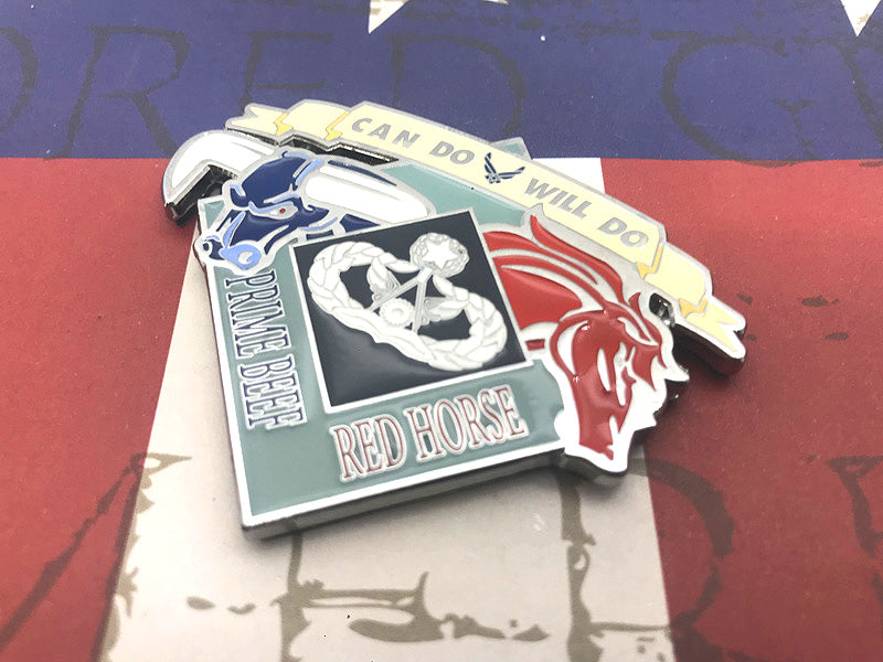 Metallic badge with horse design and text on a red and blue background