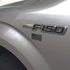 Black Chrome US Flags Metal Car Decal on a white vehicle