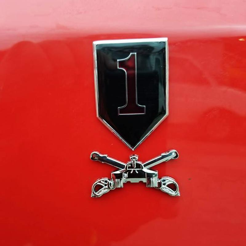 Armor Branch Insignia Metal Decal on Red Truck