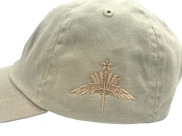 Khaki cap with embroidered senior halo badge design on a white background