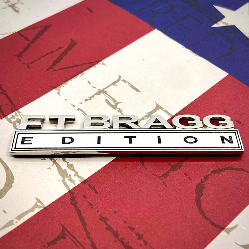 Ft Bragg Edition Metal  Emblem on an american flag