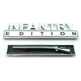Chrome 'INFANTRY EDITION' emblem and rifle-shaped object on a white background