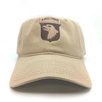 Beige cap with Airborne logo on a white background