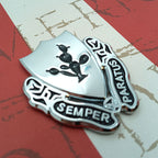 12th Cavalry Regiment Metal Car Emblem on a red and white background facing right