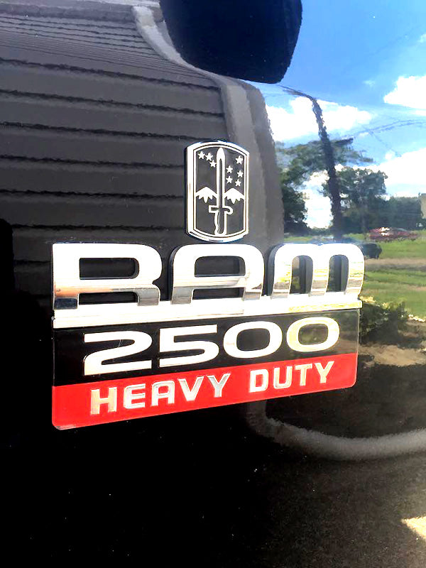 172nd Infantry Brigade Metal Car Emblem on a black Ram truck
