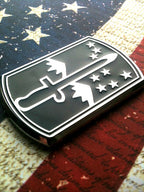172nd Infantry Brigade Metal Car Emblem Facing Right on a Red, White andlue Background