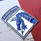 XVIII Airborne Corps Metal Decal on a red background