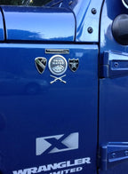 Field Artillery Branch Insignia Metal Car Emblem On a Blue Jeep Wrangler Door