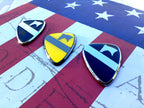 1st Cavalry Division Metal Auto Emblem One Full Color and Two in Black and Chrome on a red, white and blue background