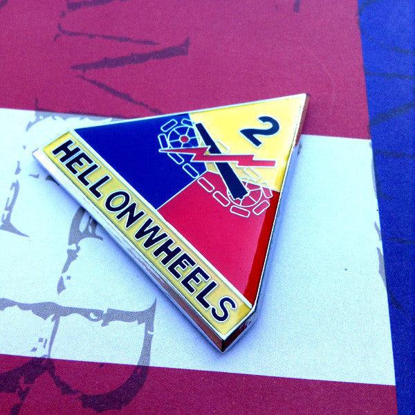 Full Color 2nd Armored Division Hell on Wheels Metal Car Emblem on a red, whote and blue background pointing right
