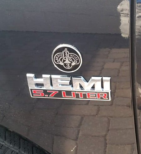 3rd Cavalry Regiment Brave Rifles Metal Car Emblem Above Hemi 5.7 Liter decal on a black truck