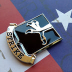 502nd Infantry Regiment Strike Metal Auto Emblem pointing to the left on a red, white and blue background