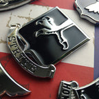502nd Infantry Regiment Strike Metal Auto Emblem angled to the left