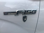 US Army Security Agency Metal Decal below f150 STX decal on a ford truck front fender