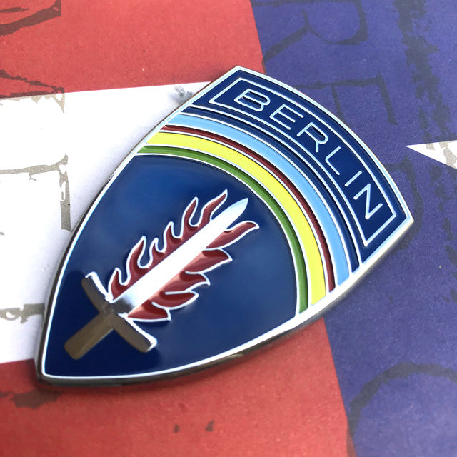 Army Berlin Brigade Metal Car Emblem on Red, White and Blue Background