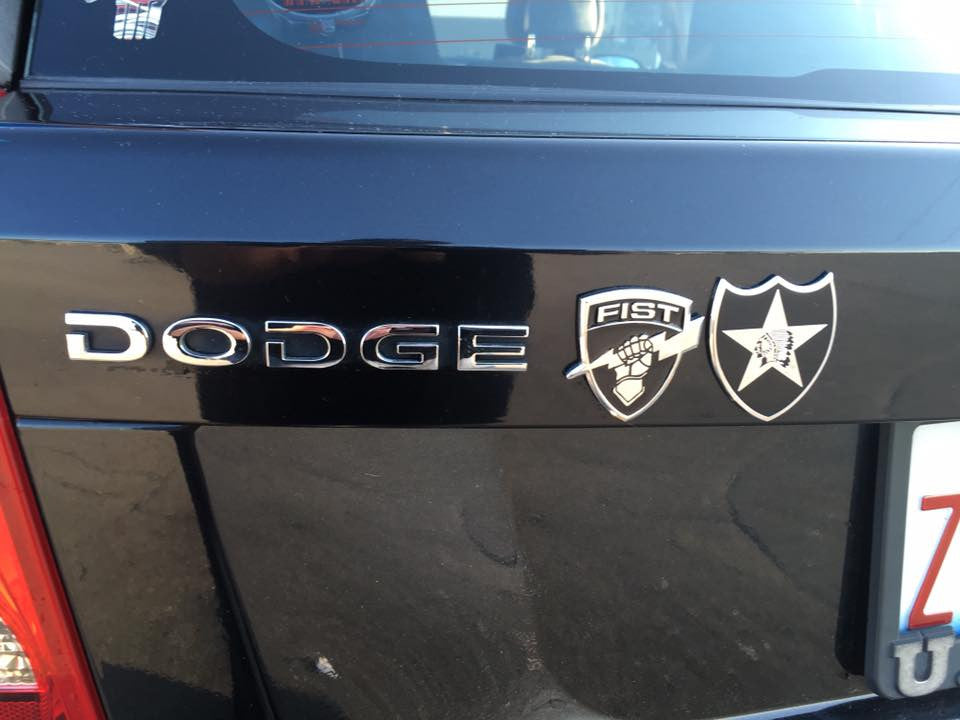 Fire Support Team FIST Metal Decal in Black and Chrome on a Dodge Trunk