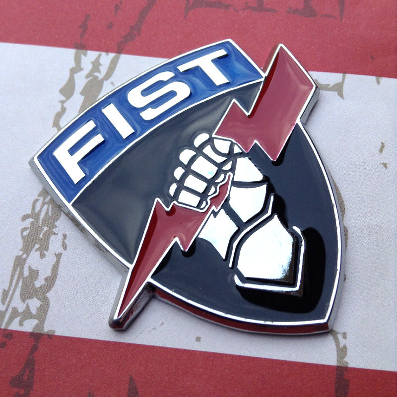 Fire Support Team FIST Metal Decal on a red and white background