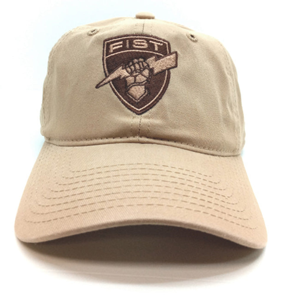 Beige cap with a FIST unit crest on a white background