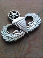 Master Parachutist Badge Jump Master Metal Car Emblem on a map surface