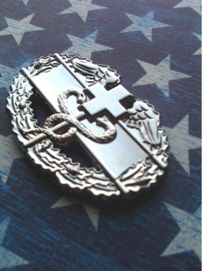 Combat Medic Badge 1st Award Metal Car Emblem on a left angle