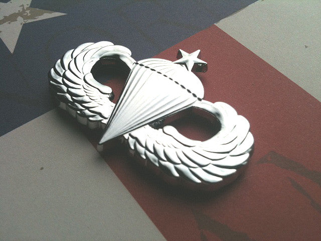 Chrome Senior Parachutist Badge Metal Decal Angled to the Right on a Red, White, and Blue Background
