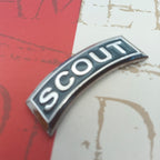 Scout Tab on a red and grey background